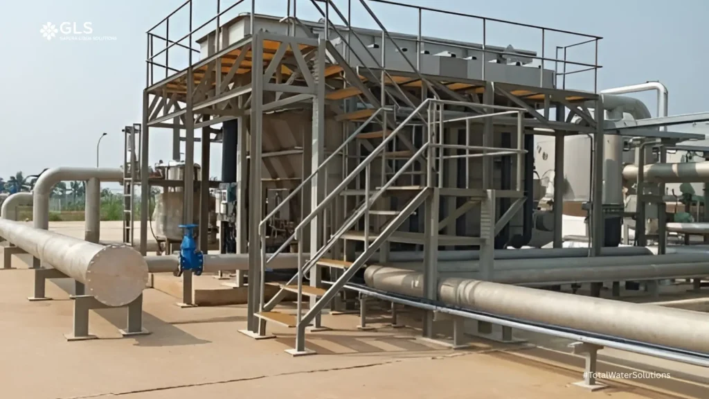 An industrial-scale DAF unit wastewater treatment system installed by PT. GLS at a client's facility, showing the complete steel structure, flotation tank, and associated piping.