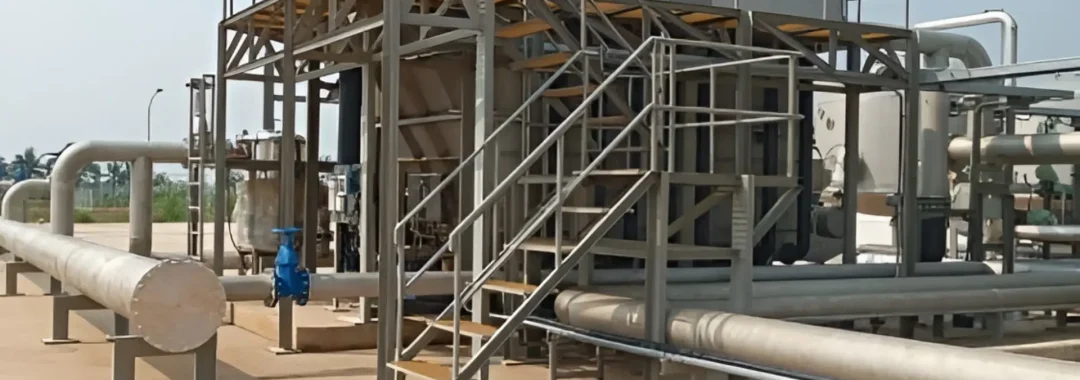 An industrial-scale DAF unit wastewater treatment system installed by PT. GLS at a client's facility, showing the complete steel structure, flotation tank, and associated piping.